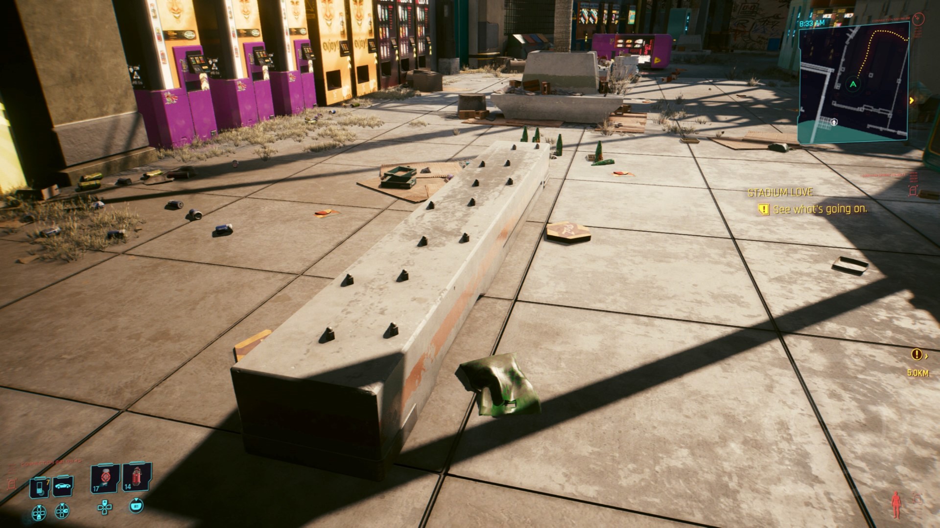 Image showing a bench with anti-homeless measures in Night City in the game Cyberpunk 2077.